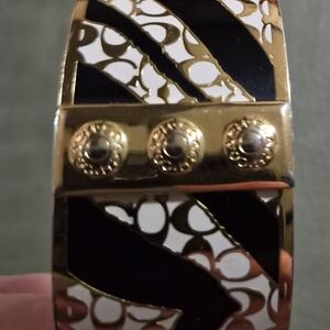 Coach Gold-tone Signature Cuff Bracelet